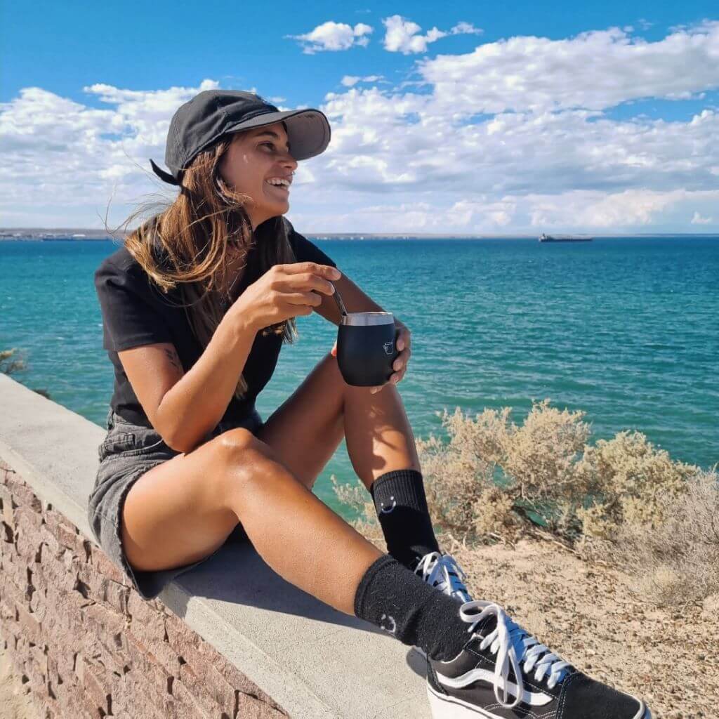 Drinking from the Condor Black gourd at the ocean