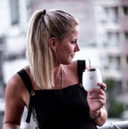 Drinking yerba mate from white mate gourd in Buenos Aires