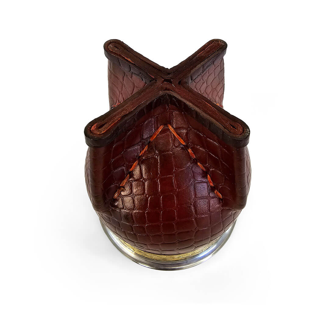 Bottom of a custom leather and stainless steel gourd