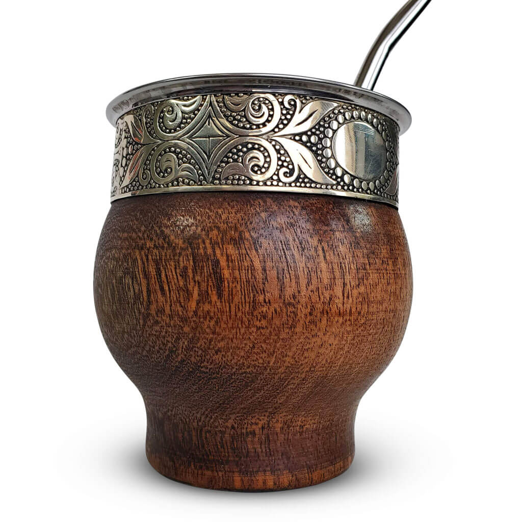 Close up of mate gourd with algarrobo wood, alpaca silver, and stainless steel