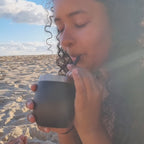 Drinking yerba mate on the beach